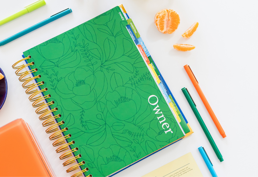Planner and supplies on a desk