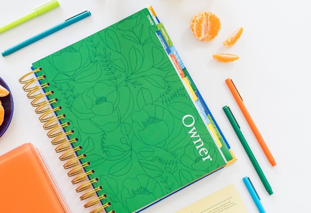 Photo of The Guided Small Business Planner with brightly colored pens