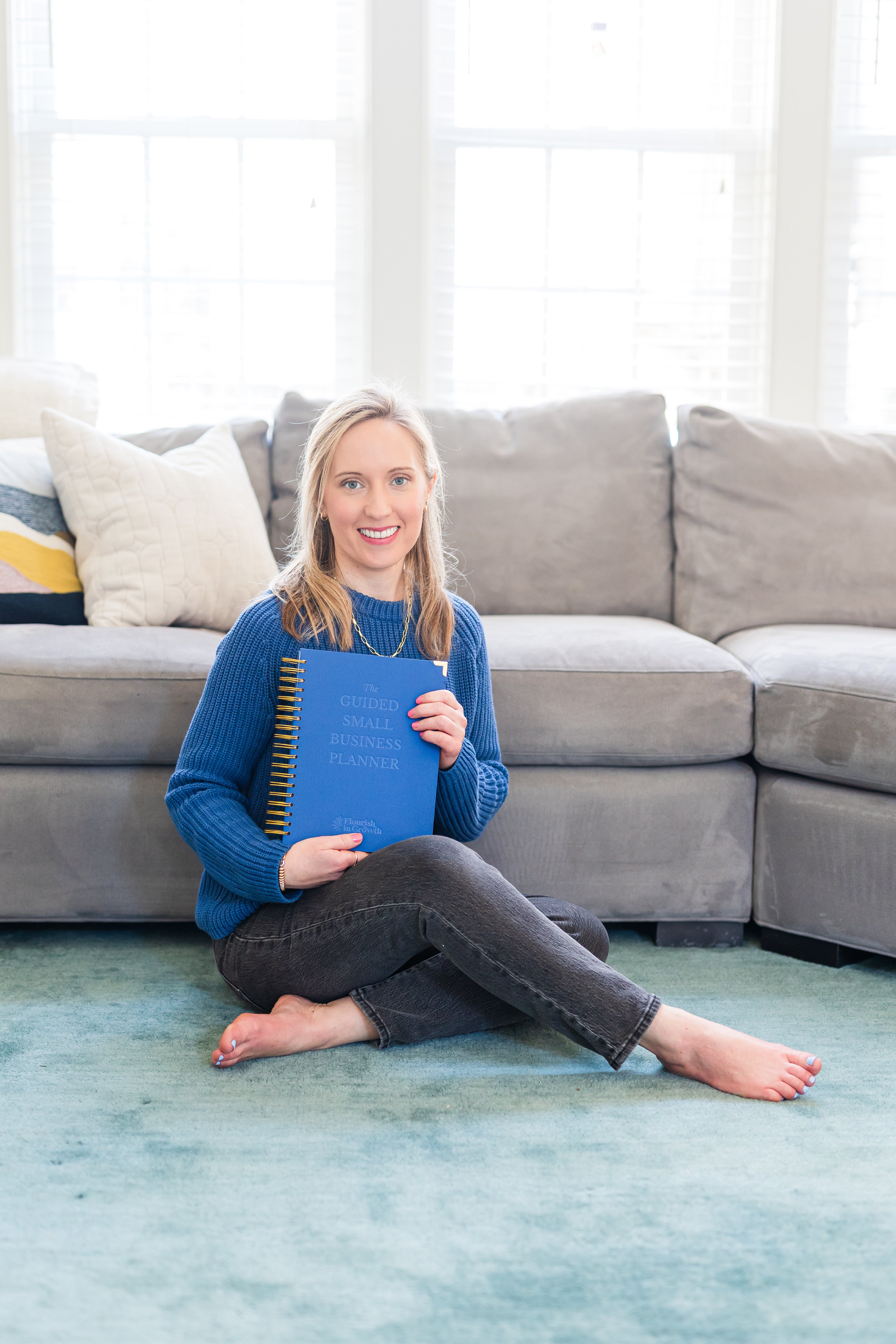 Cherith Roberson holding The Guided Small Business Planner